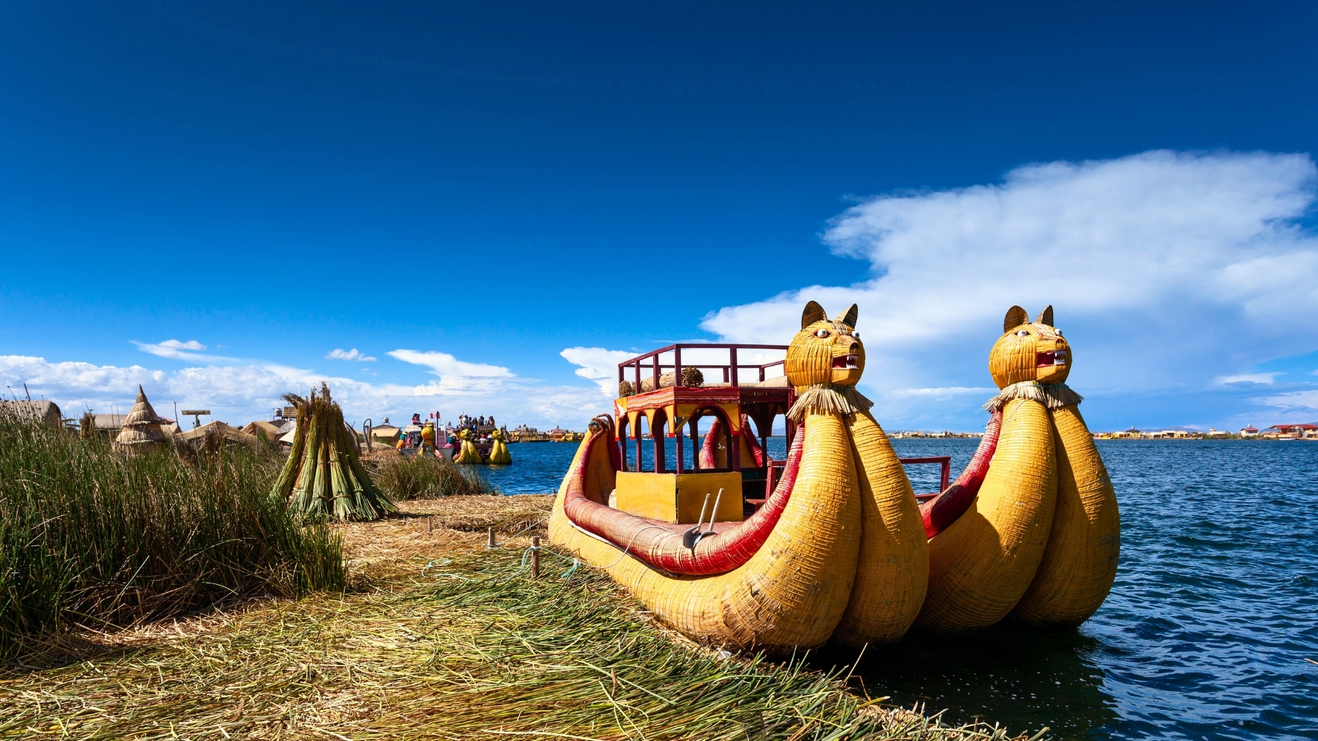 Close-up traditional reed boat as transportation for tourists, floating Uros islands on lake Titicaca in Peru, South America (1920 x 1080)